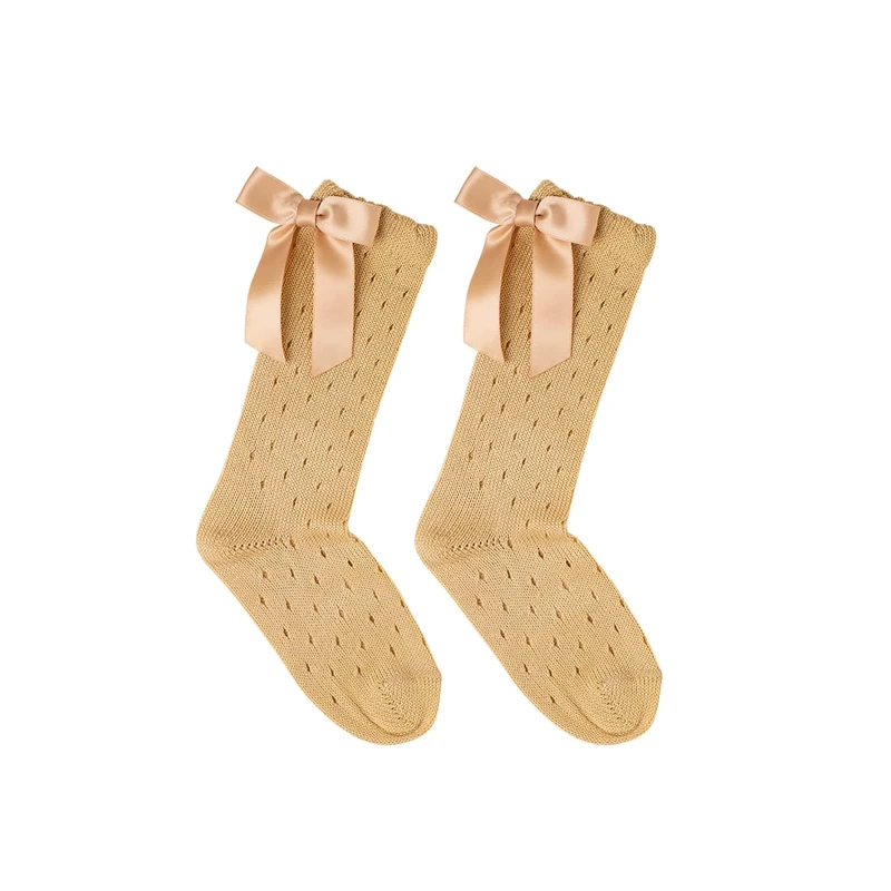 גרב ברך מחוררת צבע זהב עם פפיון